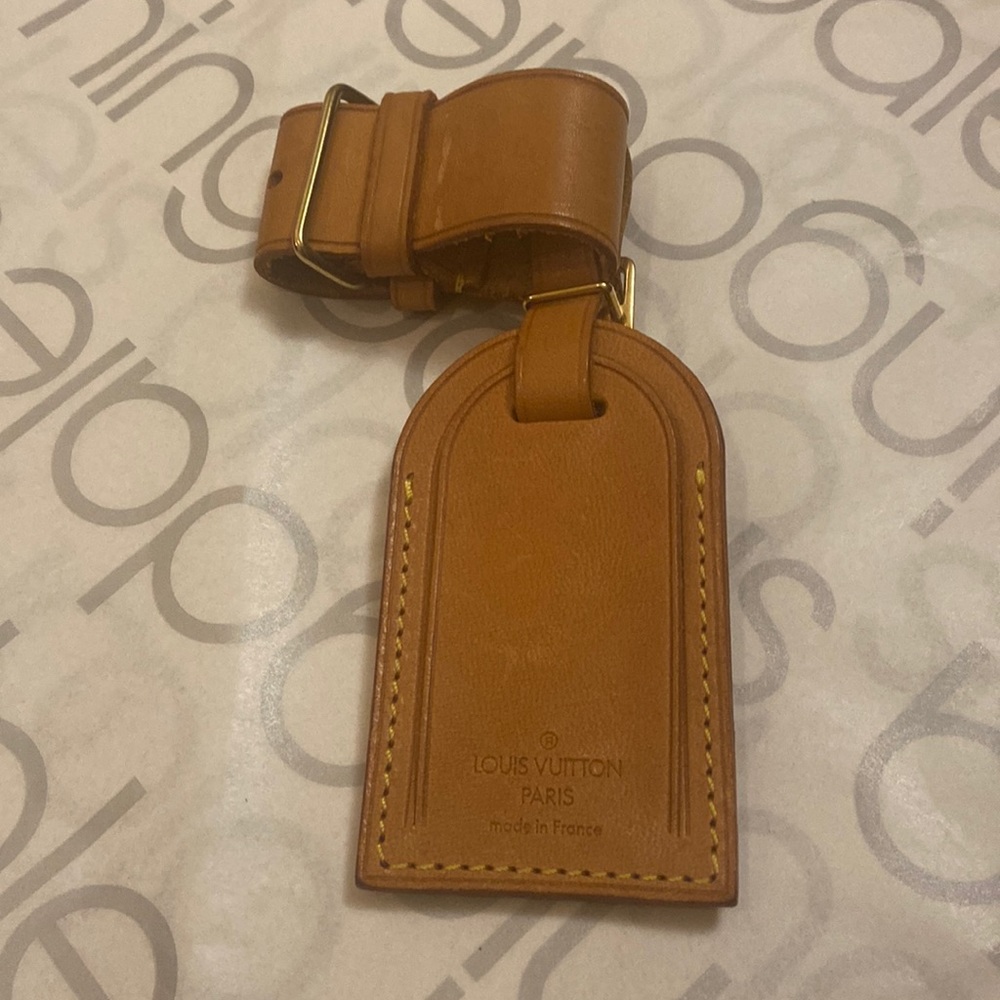Authentic Louis Vuitton tag